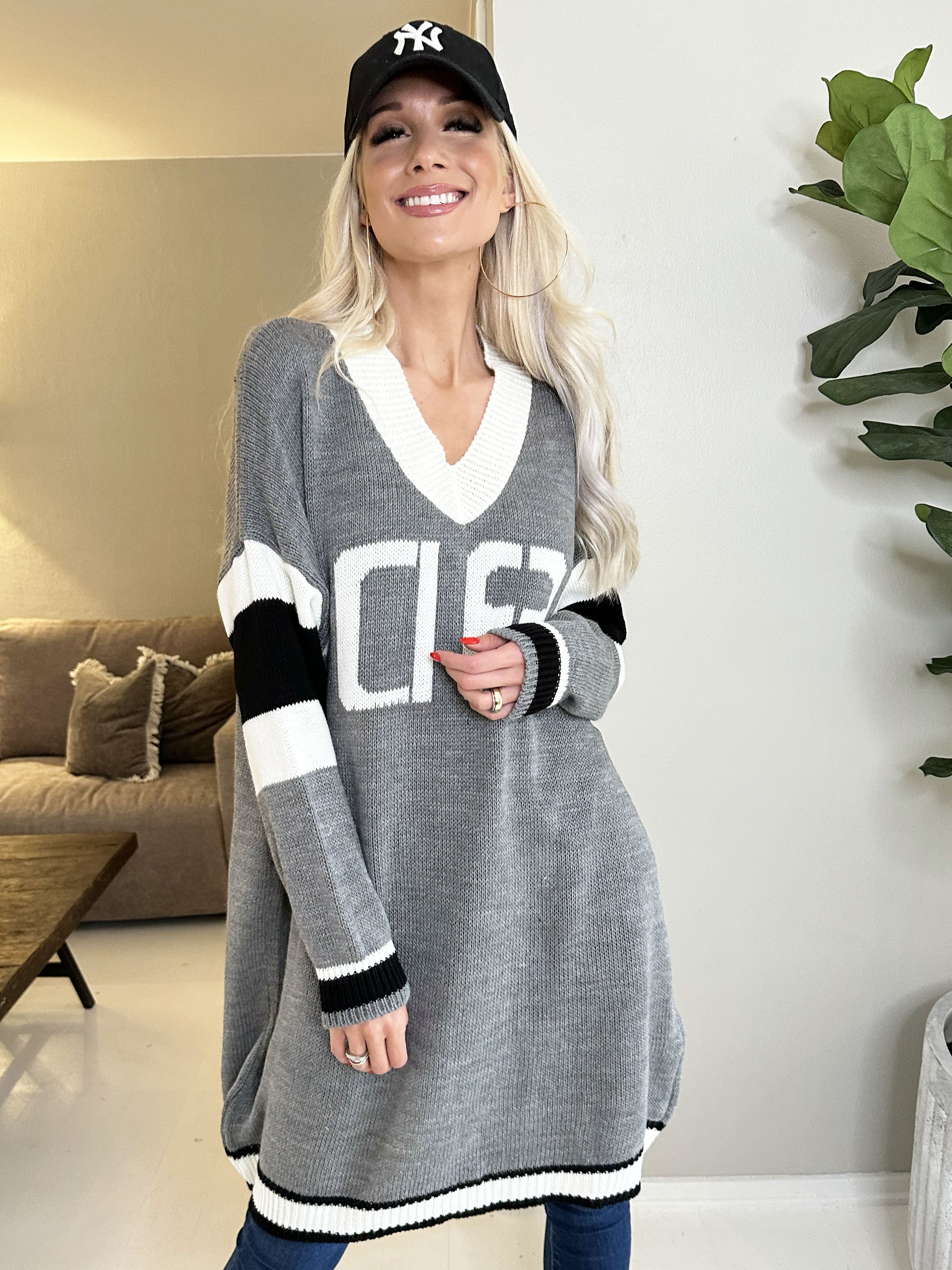 Elvira - Flerfärgad plus size stickad klänning med tryck